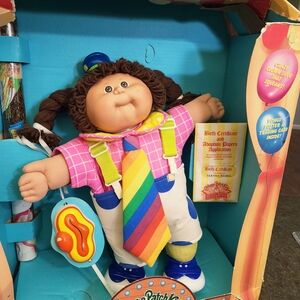 Cabbage Patch Kids Doll with Rainbow Tie and Pink Shirt